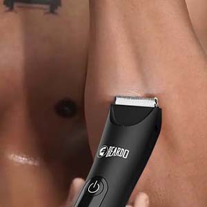 Move the trimmer against the hair growth in slow, firm strokes.